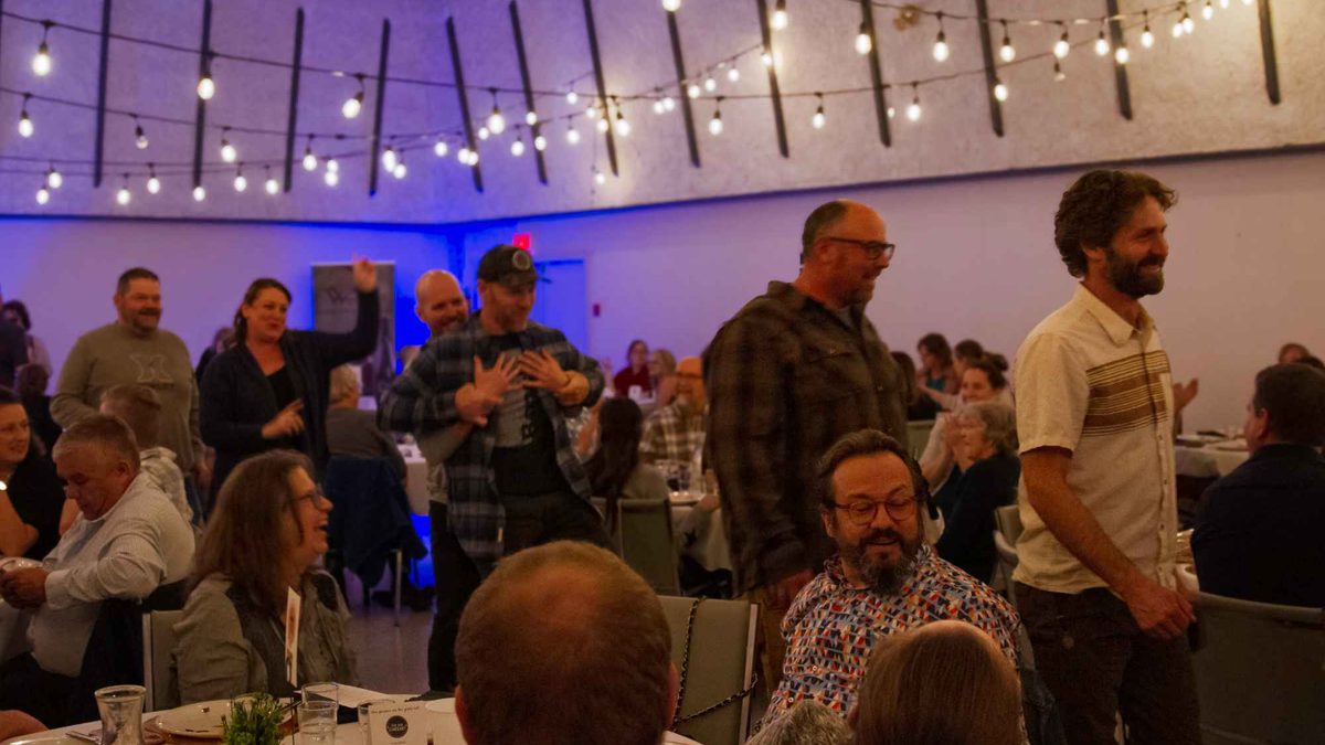 Guests applauding a winner at the chamber awards dinner
