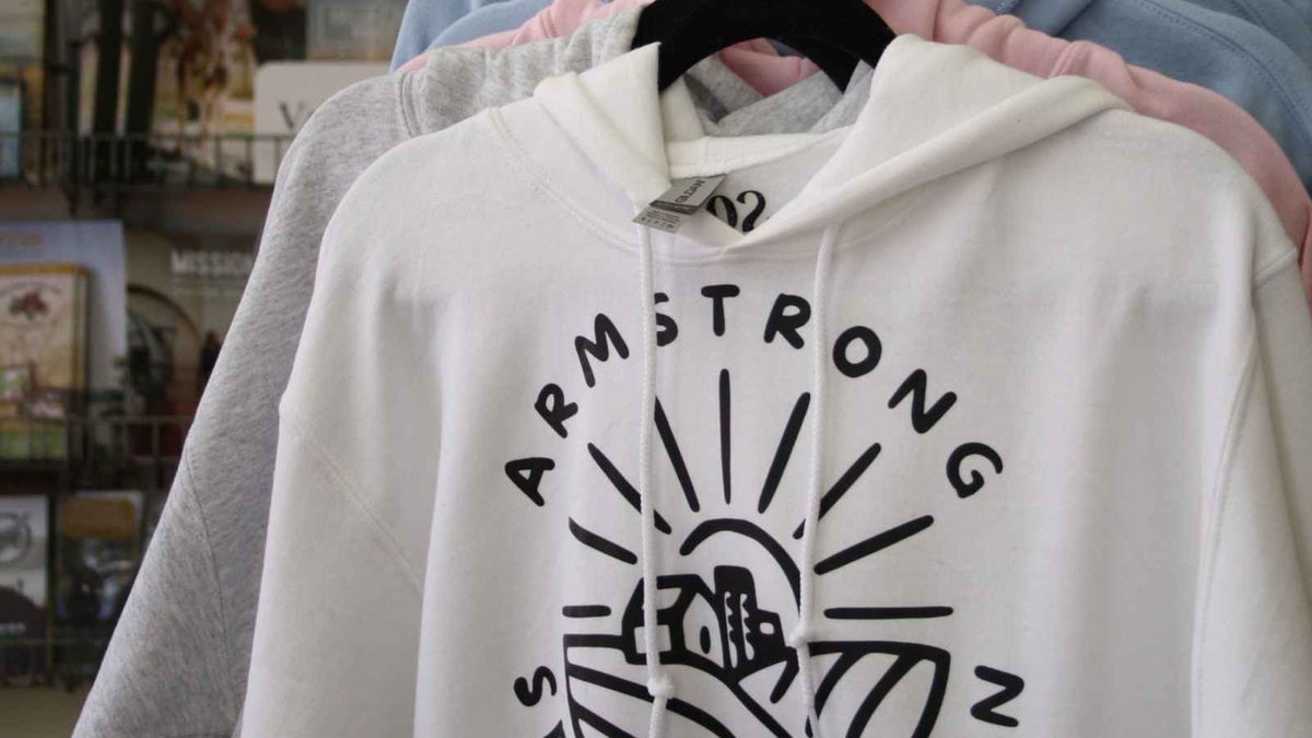Armstrong Spallumcheen hoodies on a rack in the chamber office