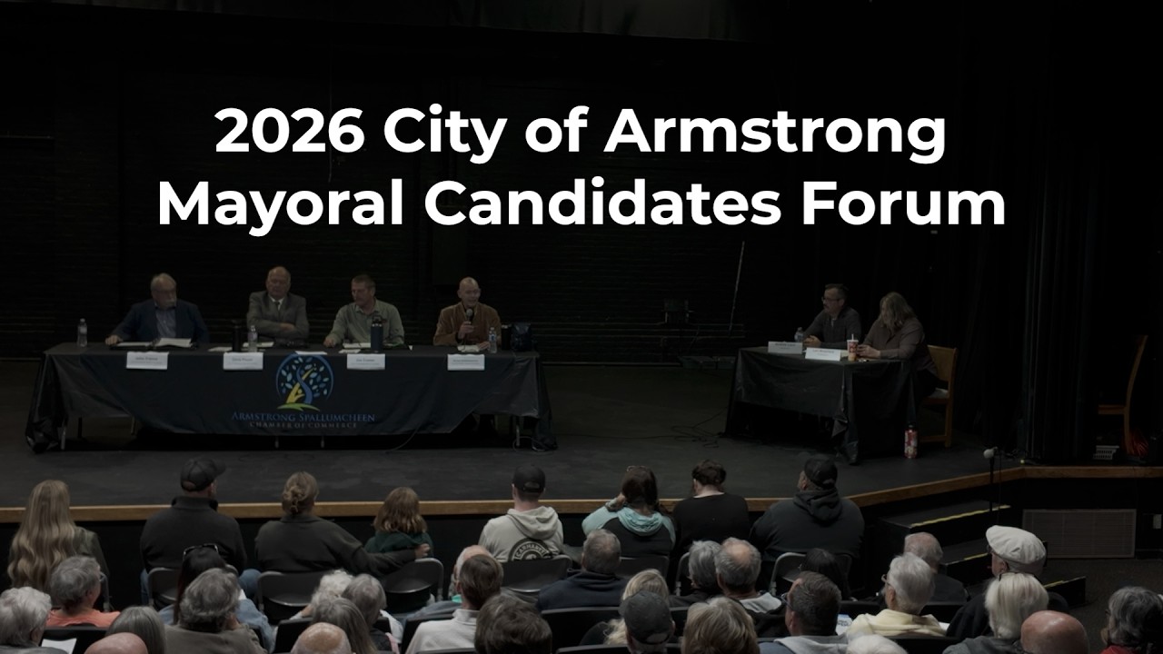 Four City of Armstrong mayoral candidates seated on stage at Centennial Theatre during the September 29, 2026 forum