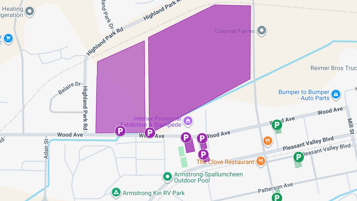 Map of Armstrong showing the paid IPE parking lots in purple and the free public parking lots in green